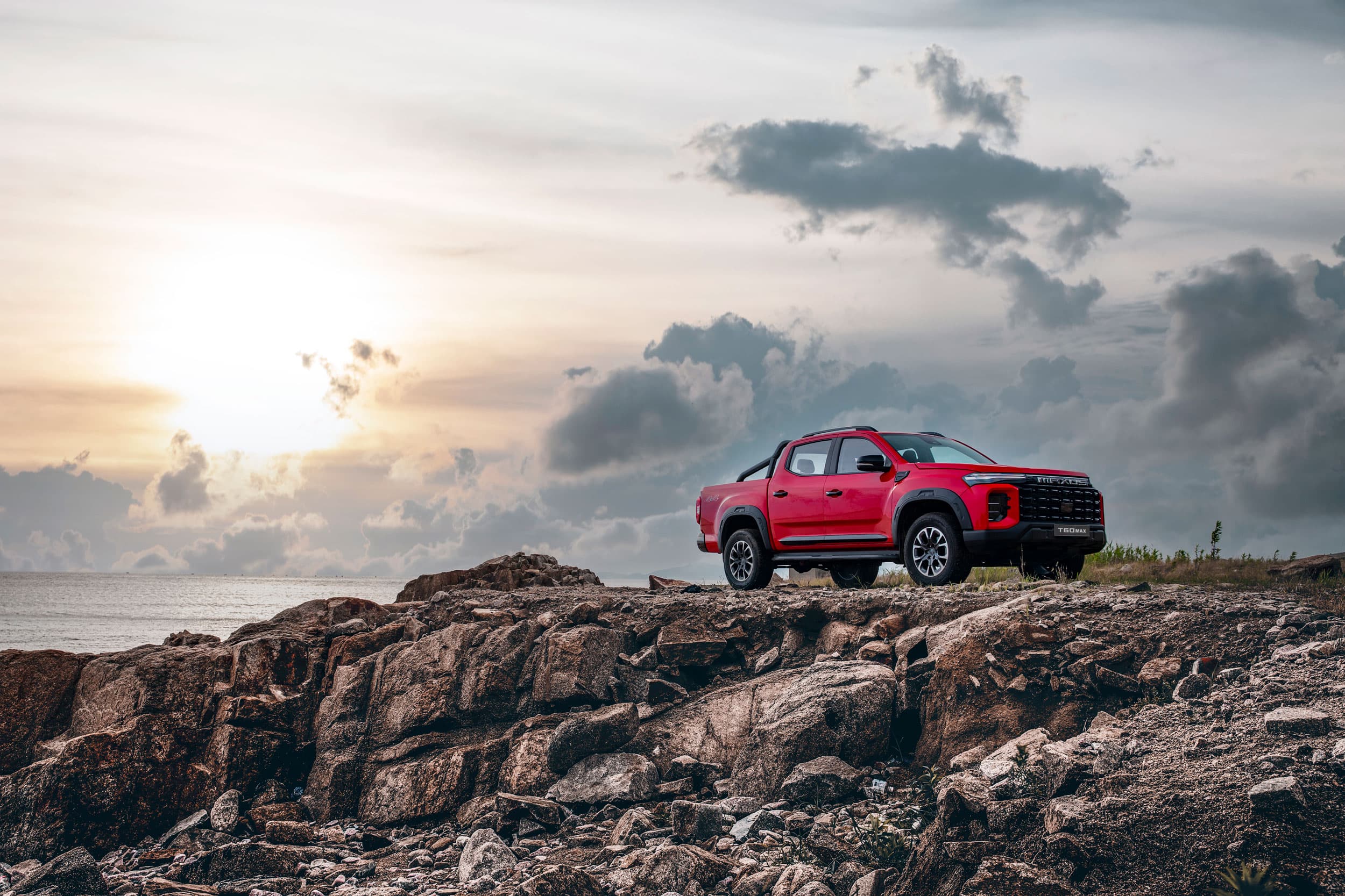 Maxus T60 Max parked on mountain (chinese red)